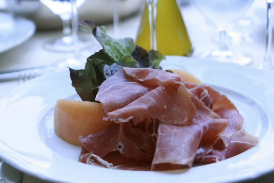 sliced prosciutto on a plate