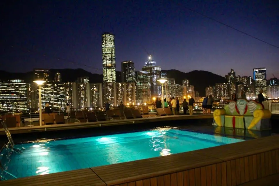 Come cruise Holland America on a global cruise, Hong Kong View from deck with swimming pool