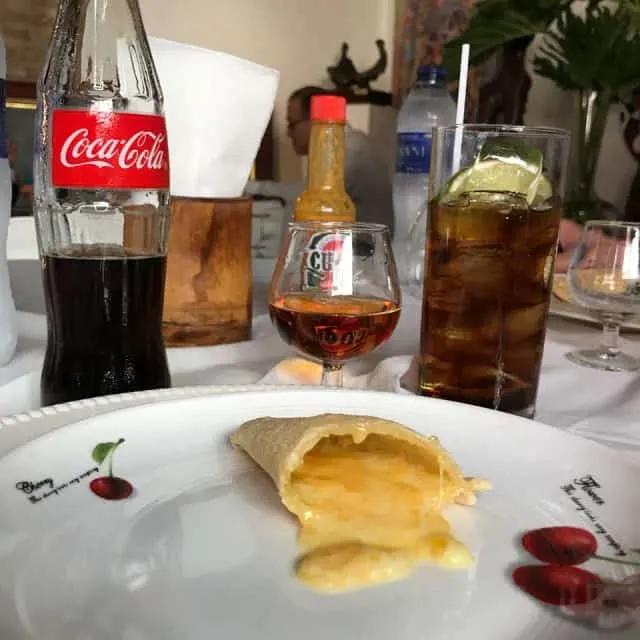 Cuba Libre con empanada queso, Dominican Republic Food, Dominican republic foods, Dominican Republic Restaurant, dominican breakfast, dominican Republic fruit