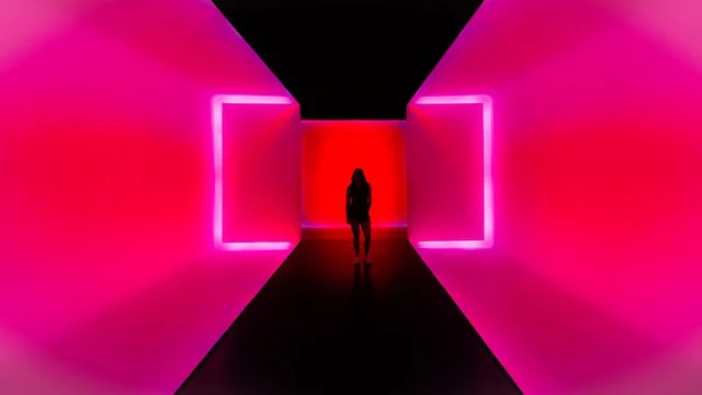 Person standing in pink Museum of the Fine Arts