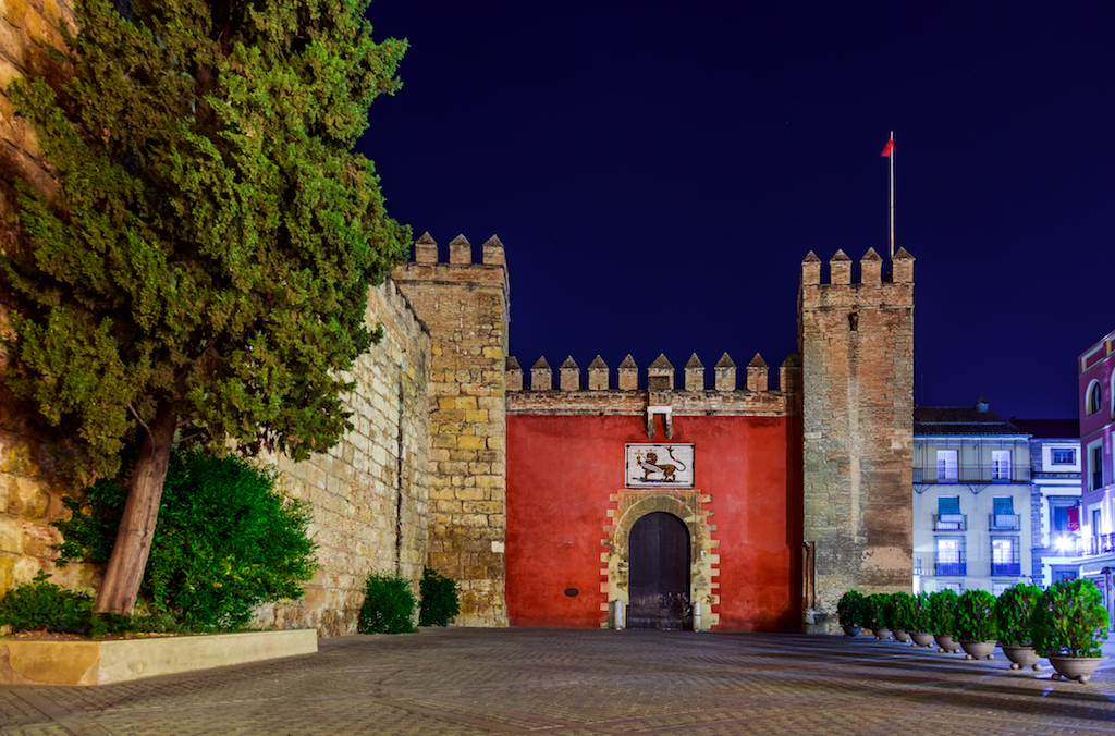 Gates to Real Alcazar Gardens in Seville Spain - architecture background