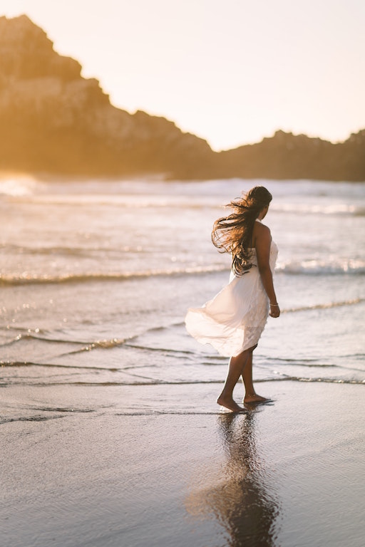 white dress girl on beach