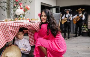 Mom in pink with kid under table, 3 days in Mexico City, guadalajara mexico beaches