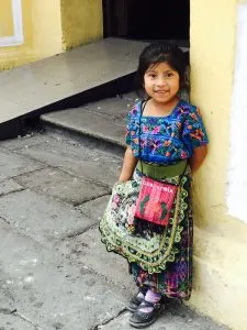 young girl, antigua guatemala things to do, curtains, antigua guatemala things to do, La ironia, Yazip mezcalm best mezcal from oaxaca, best restaurants in antigua guatemala, interesting-things-about-guatemala