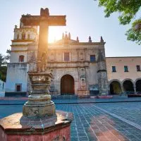 Parish of San Juan Bautista on Hidalgo square in Coyoacan, things that represent Mexico, me in the pool in Zihuatanejo, best beaches in Mexico for families, best places to retire in Mexico, Chichen Itza day trip from Cancun, snorkeling in Riviera Maya Mexico, famous things in Mexico, Cancun travel tips, best time to cruise to Mexico