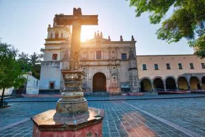 Parish of San Juan Bautista on Hidalgo square in Coyoacan, things that represent Mexico, me in the pool in Zihuatanejo, best beaches in Mexico for families, best places to retire in Mexico, Chichen Itza day trip from Cancun, snorkeling in Riviera Maya Mexico, famous things in Mexico, Cancun travel tips, best time to cruise to Mexico