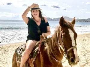 Cacinda on a horse, baja mexico beaches, best beaches in La Paz Mexico, Mexico Leisure activities,  where to stay in La Paz Mexico