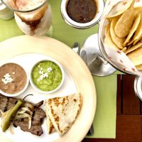 mexican food, blue and white bowl in yellow:white tube, best place for family vacation in mexico, best foods in mexico, Steak dinner, best foods in Mexico,best restaurants in Puerto Vallarta, 10 BEST Breakfast Restaurants in Cancun, best street foods Mexico City