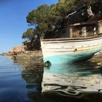 little-boat-in-Ibiza, The Best Islands for Luxury Family Vacations, Cancun boat trips