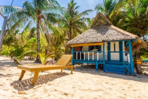 Beach chairs, clear water and beautiful view on tropical island, Cozumel beaches, Cozumel-dive-trips, Cozumel parks, best airport for Tulum