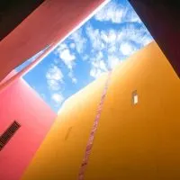 Red and yellow building, merida-Mexico, merida mexico beaches, mexico packing list, au naturel beaches caribbean