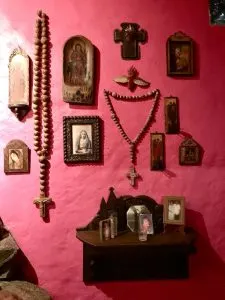Religious Art, red wall, things to do in oaxaca city, Guadalajara Mexico beaches