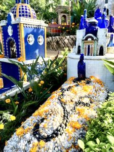blue grave with blue bottles, day of the dead Oaxaca