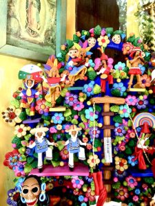 bright figurines, day of the dead Oaxaca