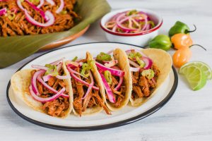 cochinita pibil. merida mexico beaches, best food in Mexico, best foods in Mexico, crazy things to do in Tulum Mexico, Puerto Escondido, famous things in Mexico, nightlife in Cancun, Enjoy Traditional Mexican Cuisine Outside the Hotel Zone, Cozumel Travel tips, best breakfast in Cancun