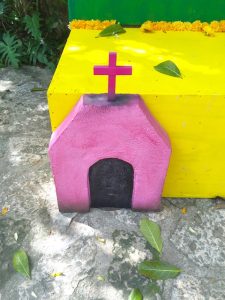 pink and yellow grave, day of the dead Oaxaca