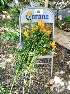 yellow flowers on a Corona chair, day of the dead Oaxaca