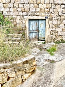 old blue Vis door, best places to visit in Croatia