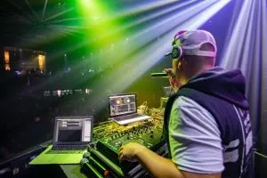 DJ man playing music, nightlife in Puerto Vallarta, nightlife in Cancun