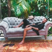 man on a couch, what to wear in Tulum