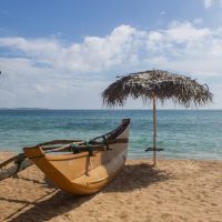 Sand and fishing boats on the beach, marietta islands, hidden beaches Mexico, 5-best-places-for-a-secluded-break, beaches Tulum resort, worst places to visit in Mexico, Aruba water activities, de palma island, best time to visit Aruba