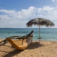 Sand and fishing boats on the beach, marietta islands, hidden beaches Mexico, 5-best-places-for-a-secluded-break, beaches Tulum resort, worst places to visit in Mexico, Aruba water activities, de palma island, best time to visit Aruba