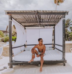 what to wear in Tulum, man in bungalow