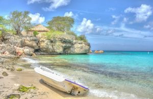 boat by shore, beach resort, what to do in Curacao from cruise ship
