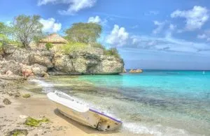 boat by shore, beach resort, what to do in Curacao from cruise ship, best adults only resorts in Mexico, best adults only all inclusive Mexico