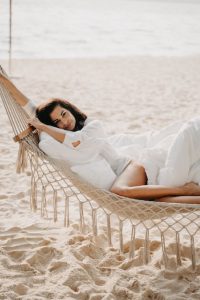 girl on a hammock, best beach clubs in cancun