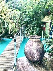 old pot by pool, where to stay in guadeloupe islands
