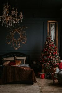 Christmas in Dublin, a Christmas tree near a bed 